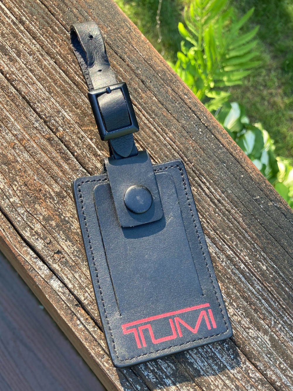Tumi Black Leather Luggage Tag with Red Logo